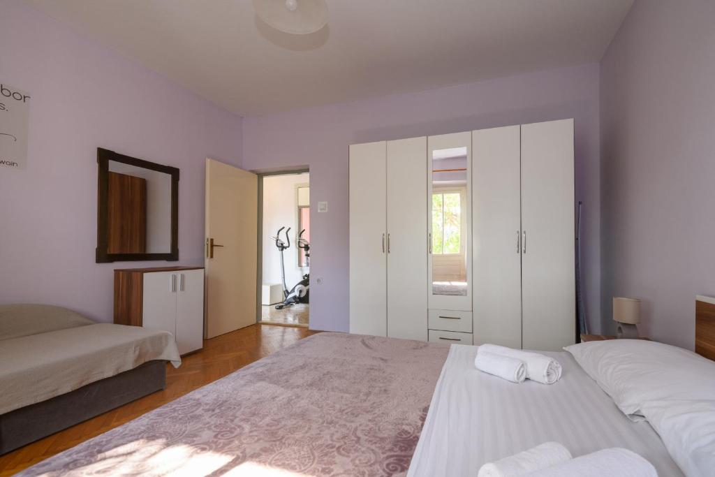 Postel nebo postele na pokoji v ubytování Apartment Rosehip