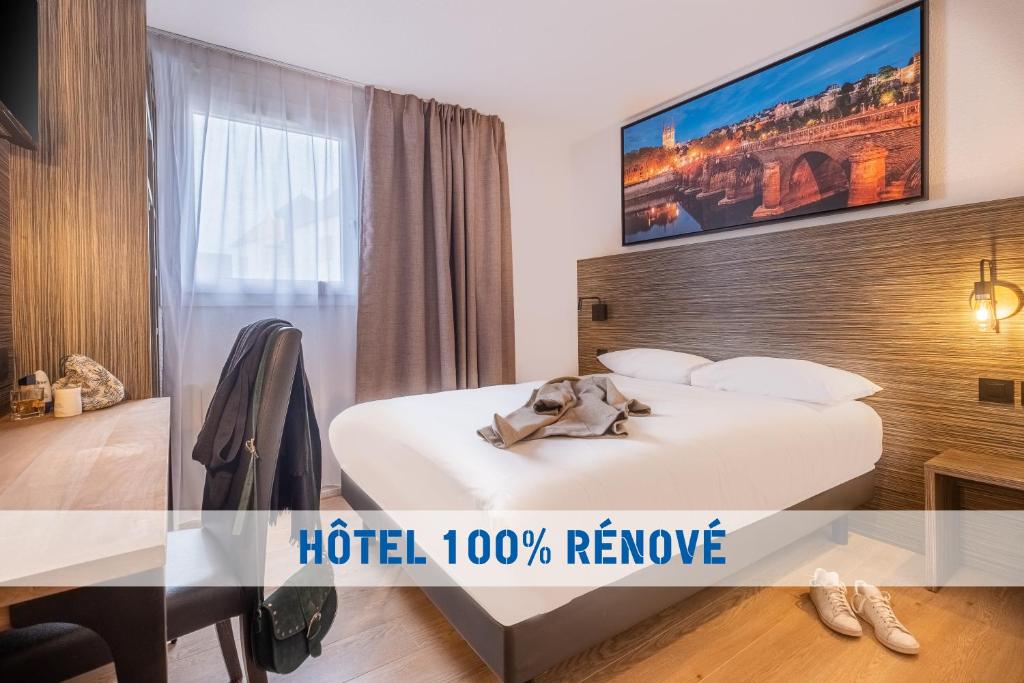 a hotel review of a hotel room at The Originals City, Angers Sud, Le Village 49 in Les Ponts-de-Cé