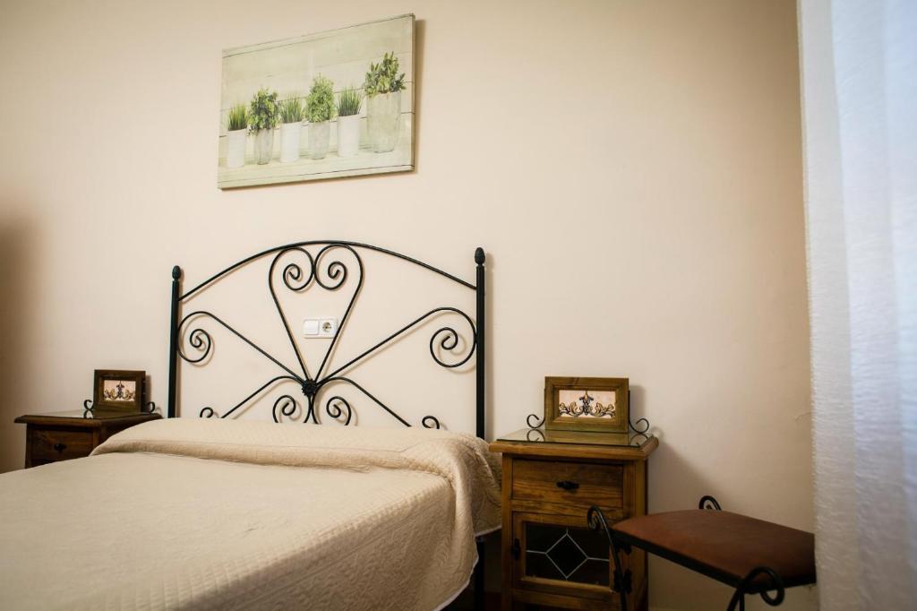 Posteľ alebo postele v izbe v ubytovaní Hostal Restaurante El Paso