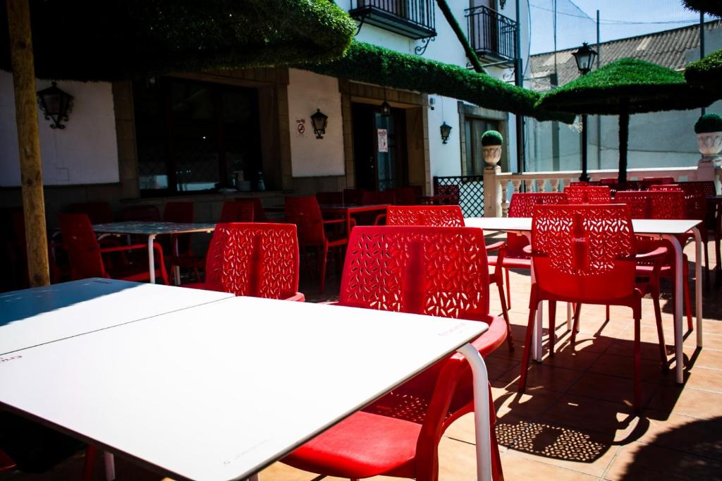 Reštaurácia alebo iné gastronomické zariadenie v ubytovaní Hostal Restaurante El Paso