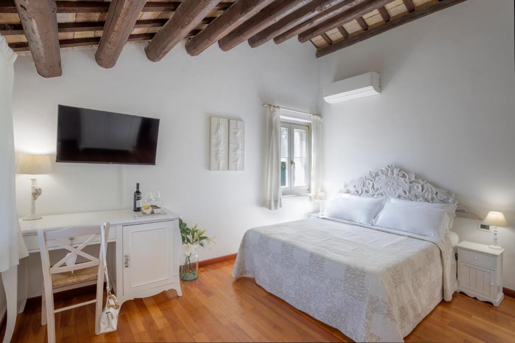 Posteľ alebo postele v izbe v ubytovaní Villa LeMarche b&b