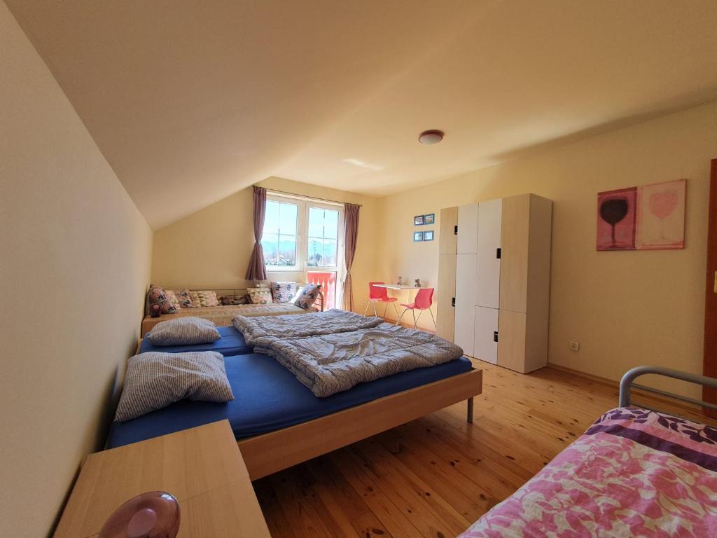Posteľ alebo postele v izbe v ubytovaní Villa Leika - Panoramablick am Riesengebirge