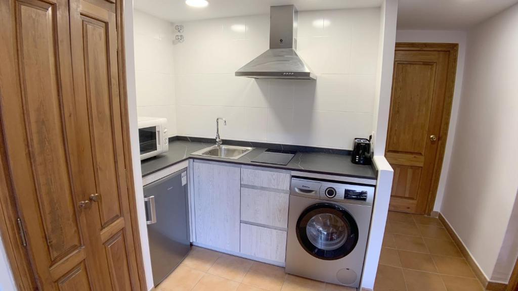 Kuchyň nebo kuchyňský kout v ubytování C12 - Apartamento Casa Llorgodo 3 - Villmor