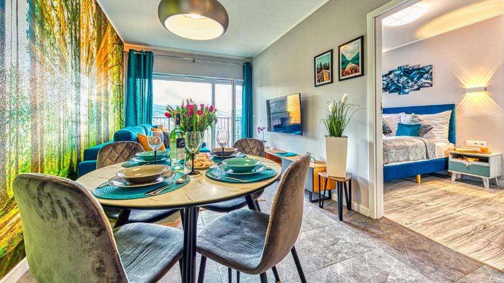 Posedenie v ubytovaní Apartament IZER ZONE 21 z Sauną ogólnodostępną - 5D Apartamenty