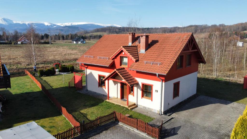 an aerial view of a house with a red roof at Villa Leika - Panoramablick am Riesengebirge in Mysłakowice