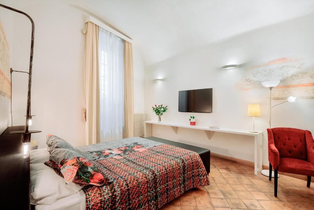 Una televisión o centro de entretenimiento en Relais Giulia