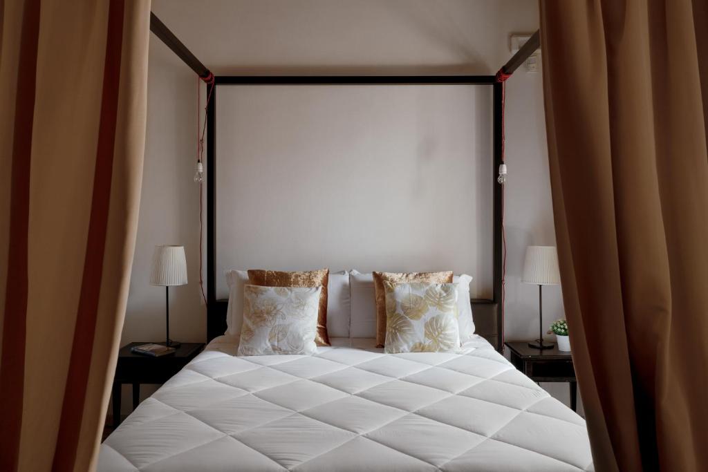 Cama o camas de una habitación en Relais Giulia
