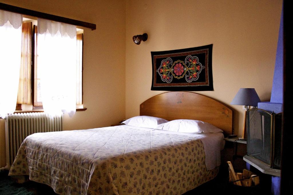 Postel nebo postele na pokoji v ubytování Hotel Galaxias