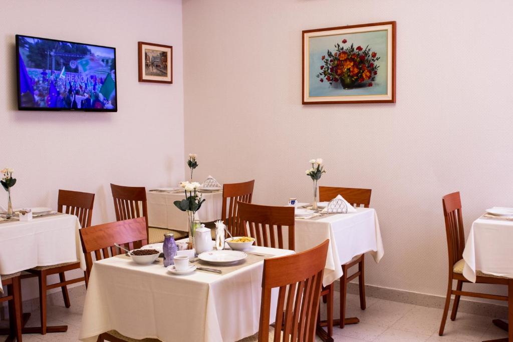 TV a/nebo společenská místnost v ubytování Hotel Paradiso