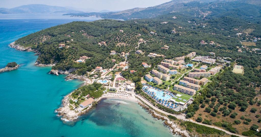 an aerial view of a resort on a island in the water at Mareblue Beach in St. Spyridon Corfu