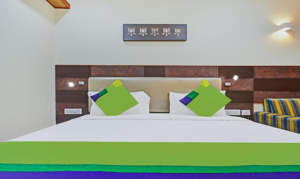 Postel nebo postele na pokoji v ubytování Hotel Mandovin, Udaipur