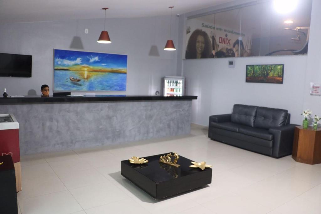 TV a/nebo společenská místnost v ubytování Onix Hotel Praia de Piata