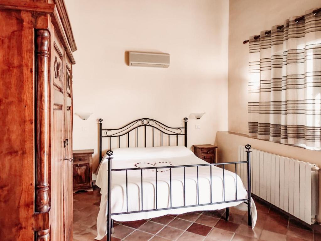Voodi või voodid majutusasutuse Terme Acqua Pia toas