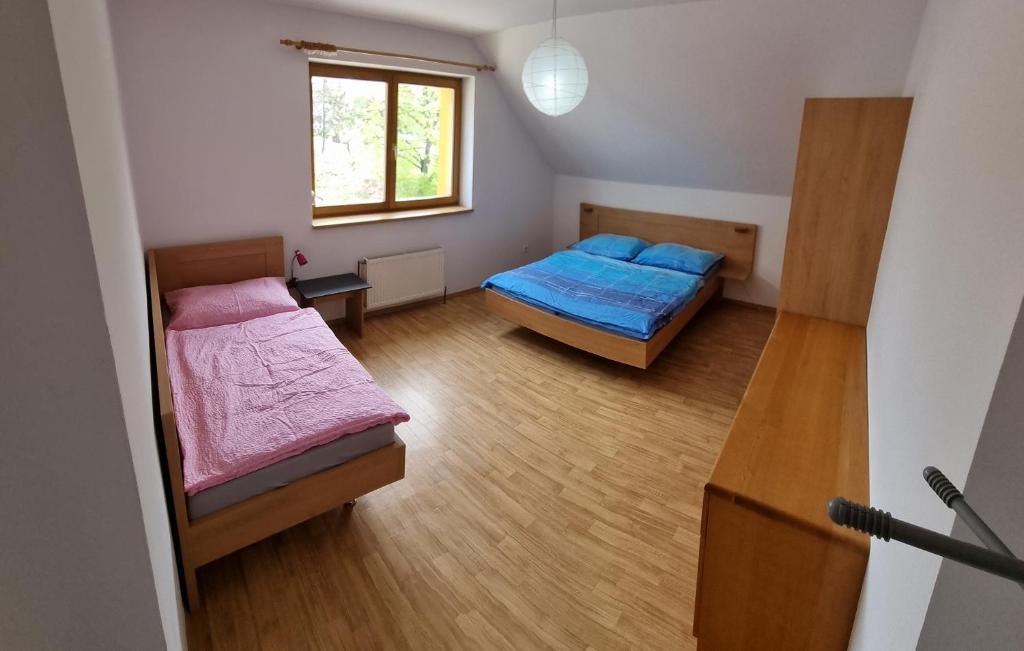 Postel nebo postele na pokoji v ubytování Apartmány Znojmo