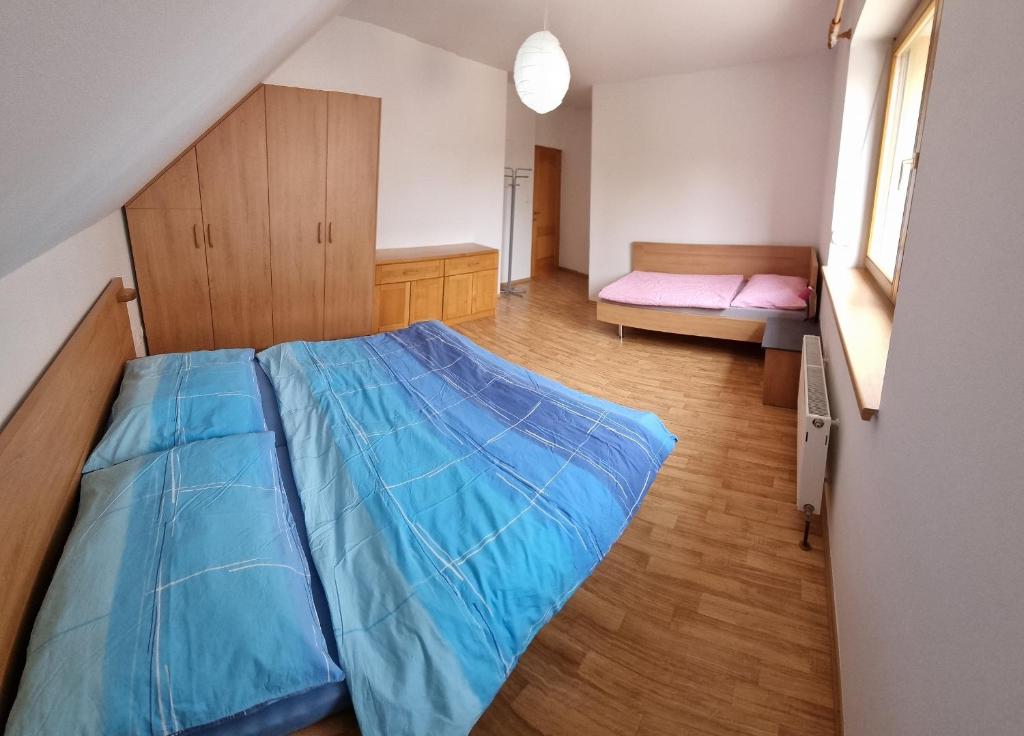 Postel nebo postele na pokoji v ubytování Apartmány Znojmo