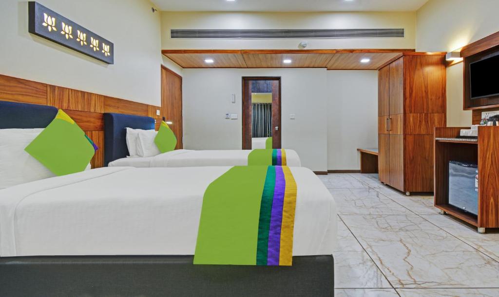 Postel nebo postele na pokoji v ubytování Hotel Mandovin, Udaipur