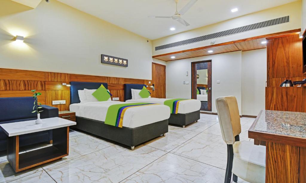 Postel nebo postele na pokoji v ubytování Hotel Mandovin, Udaipur