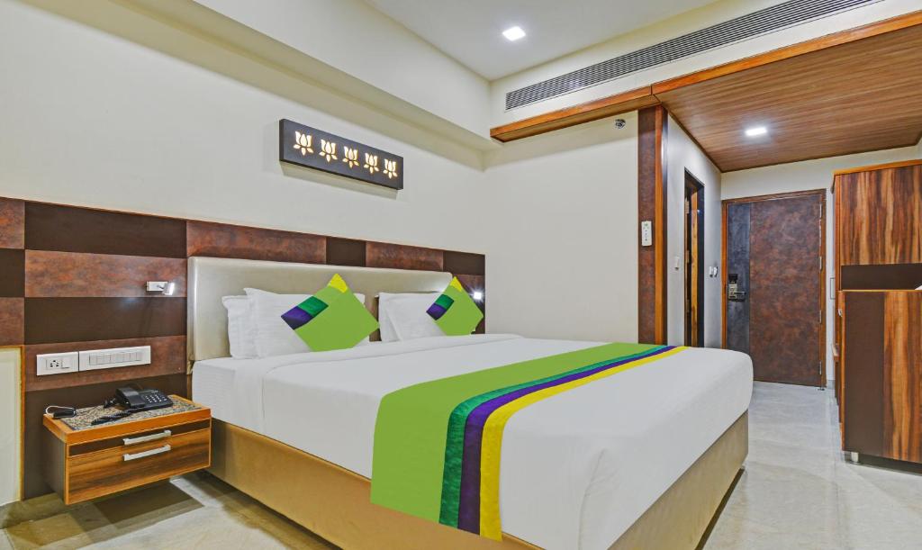 Postel nebo postele na pokoji v ubytování Hotel Mandovin, Udaipur
