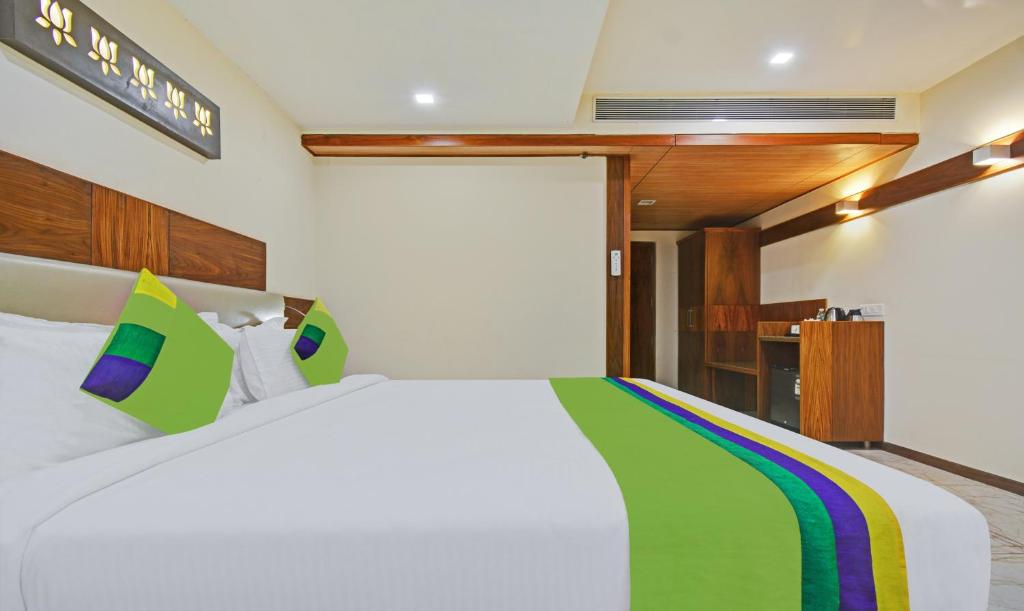 Postel nebo postele na pokoji v ubytování Hotel Mandovin, Udaipur