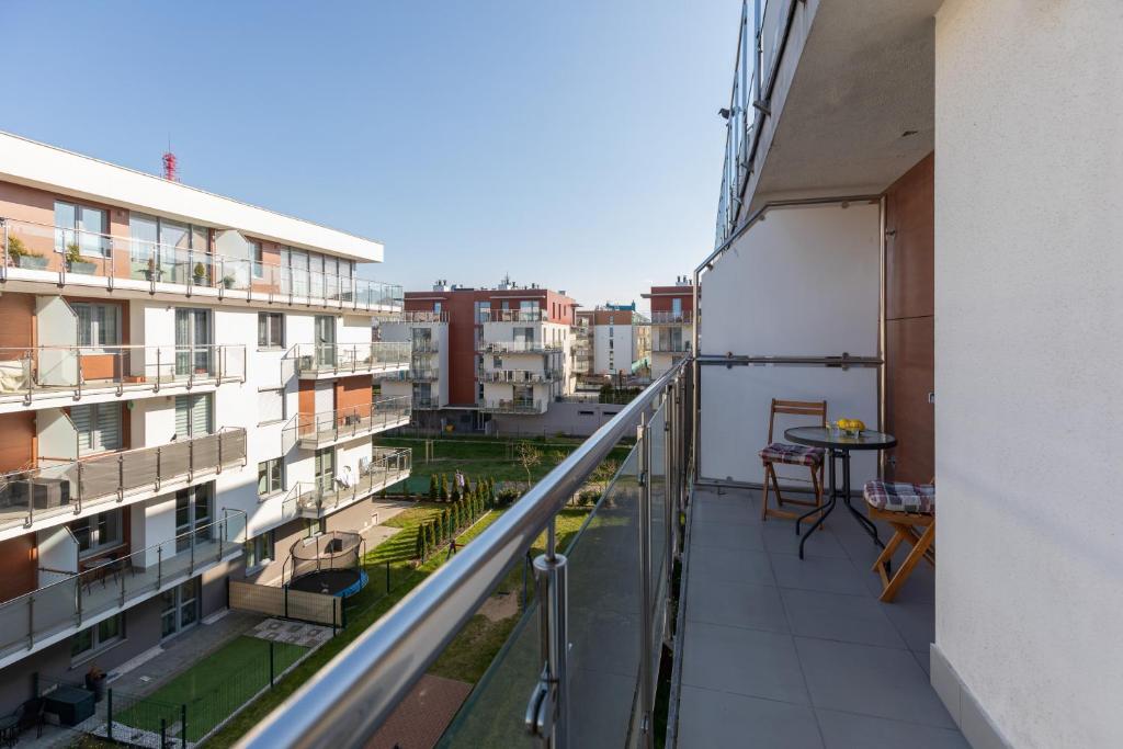 Balkón alebo terasa v ubytovaní Apartamenty Bursztynowe V by Noclegi Renters