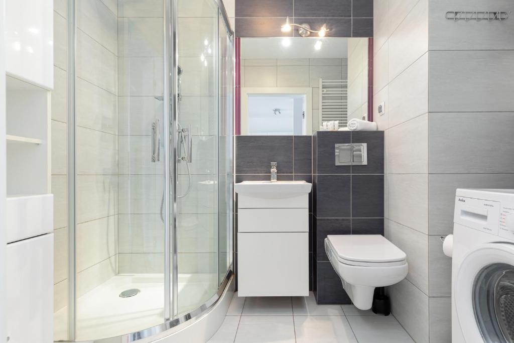 Kúpeľňa v ubytovaní Apartamenty Bursztynowe V by Noclegi Renters