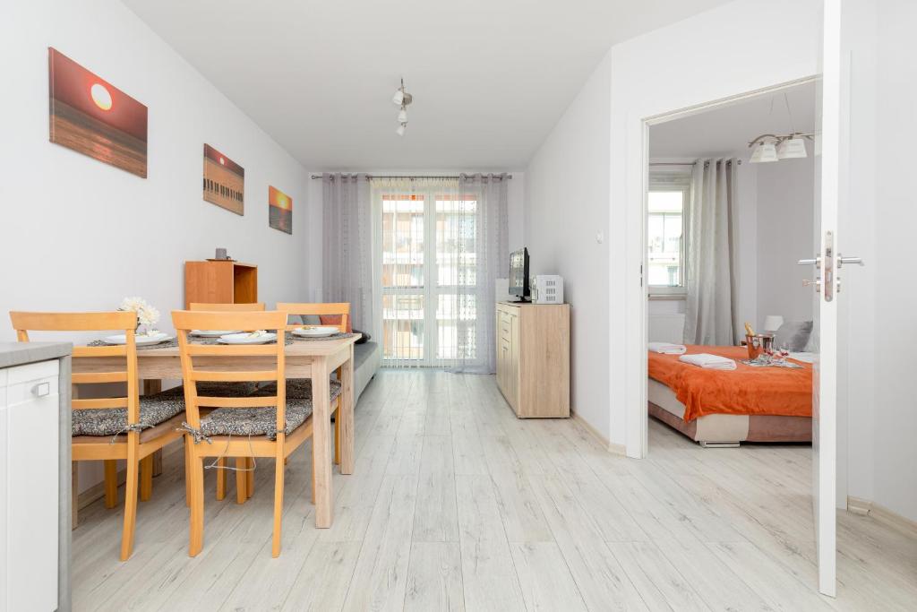 Posteľ alebo postele v izbe v ubytovaní Apartamenty Bursztynowe V by Noclegi Renters