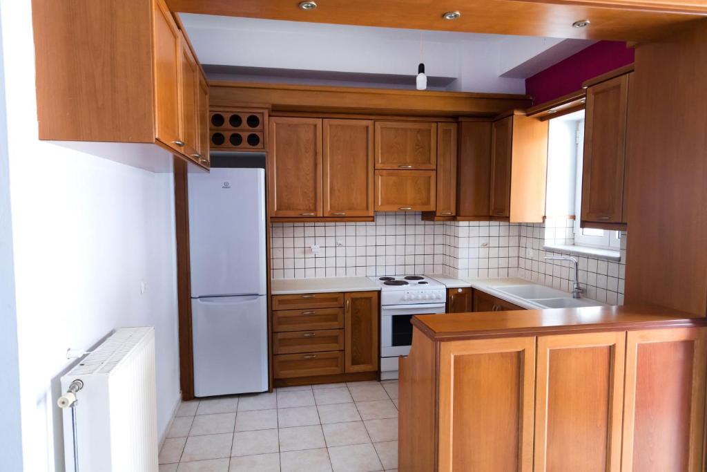 A kitchen or kitchenette at Aria apts 100 m from the beach by PosarelliVillas