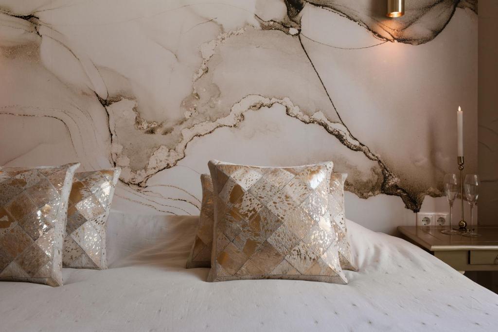 Postel nebo postele na pokoji v ubytování Boutique Hotel Elburg met Tapperij