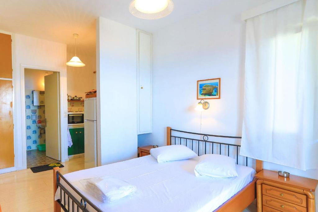 Posteľ alebo postele v izbe v ubytovaní Vista Mare Faros