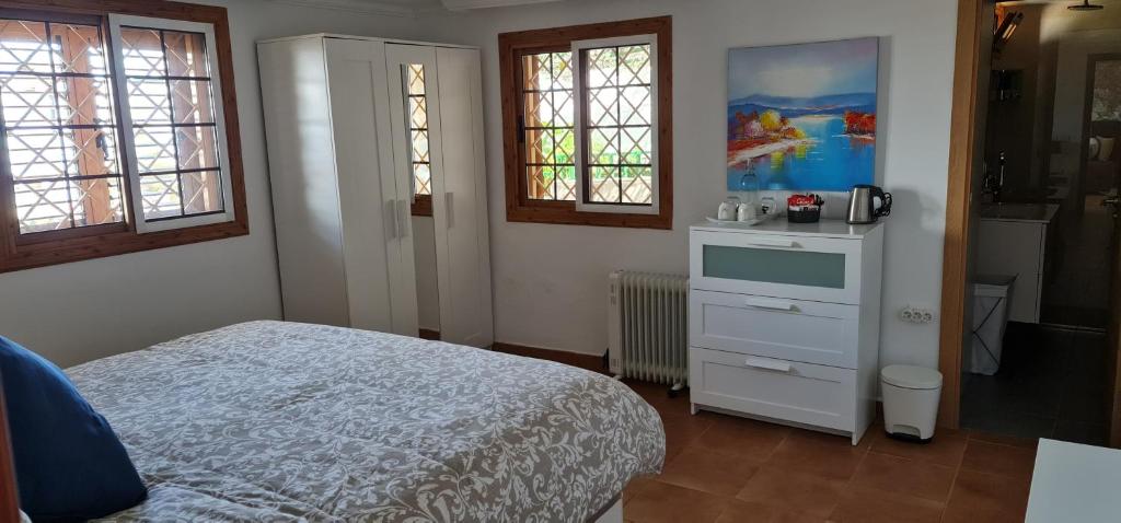 Postel nebo postele na pokoji v ubytování Casa Ramon B&B