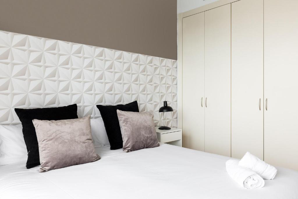 Posteľ alebo postele v izbe v ubytovaní chicStays Apartment Ciutadella Park