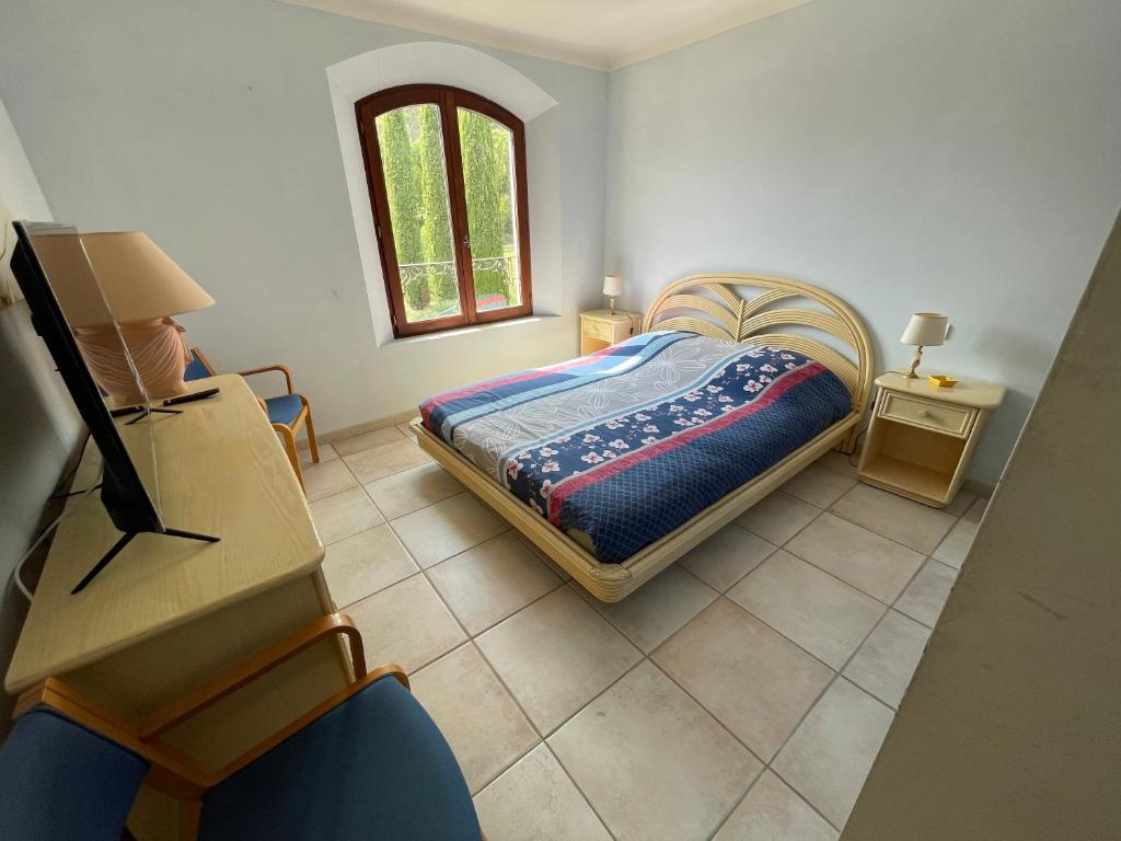 Postel nebo postele na pokoji v ubytování BASTIDE DU DEFENDS
