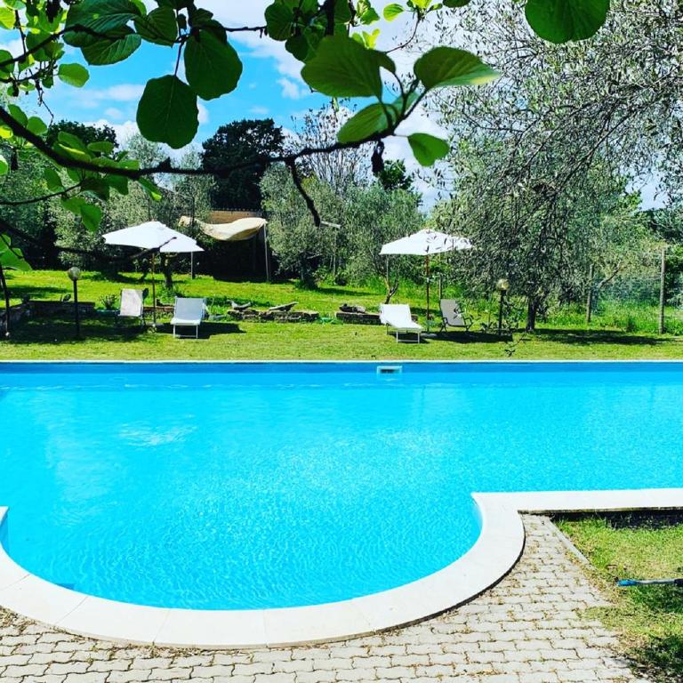 Bazén v ubytovaní Country House Maremma Nel Tufo alebo v jeho blízkosti