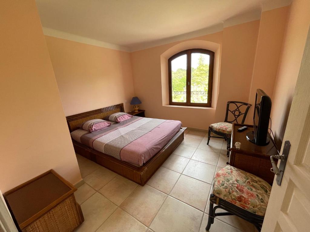 Postel nebo postele na pokoji v ubytování BASTIDE DU DEFENDS