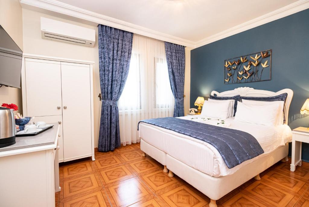 Postel nebo postele na pokoji v ubytování 1207 Hotel Special Class Sultanahmet