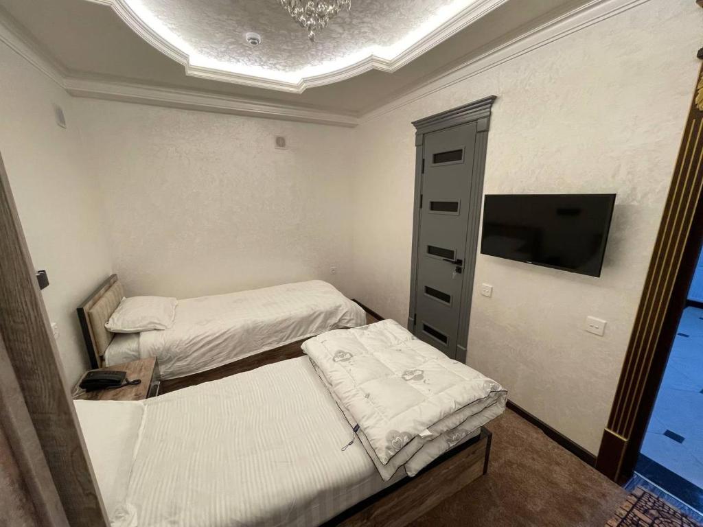 RAMZIYA NUR Guest house - Chambre Quadruple Confort