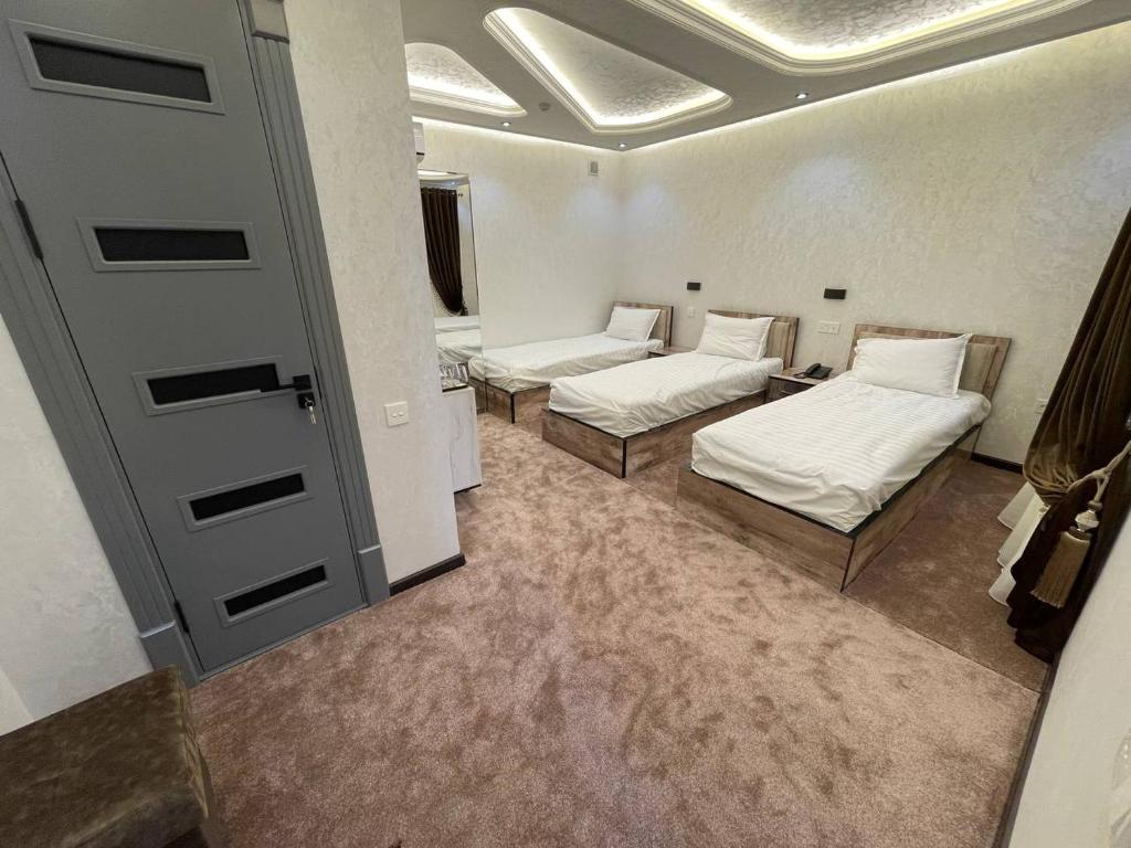 RAMZIYA NUR Guest house - Triple Chambre Avec Balcon