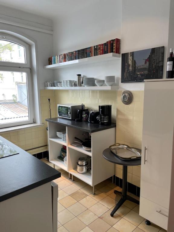Kuchyň nebo kuchyňský kout v ubytování Apartment Factory