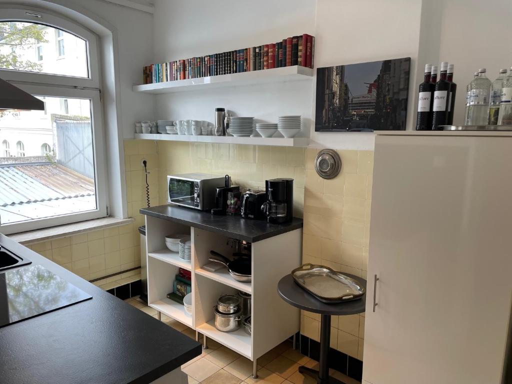 Kuchyň nebo kuchyňský kout v ubytování Apartment Factory