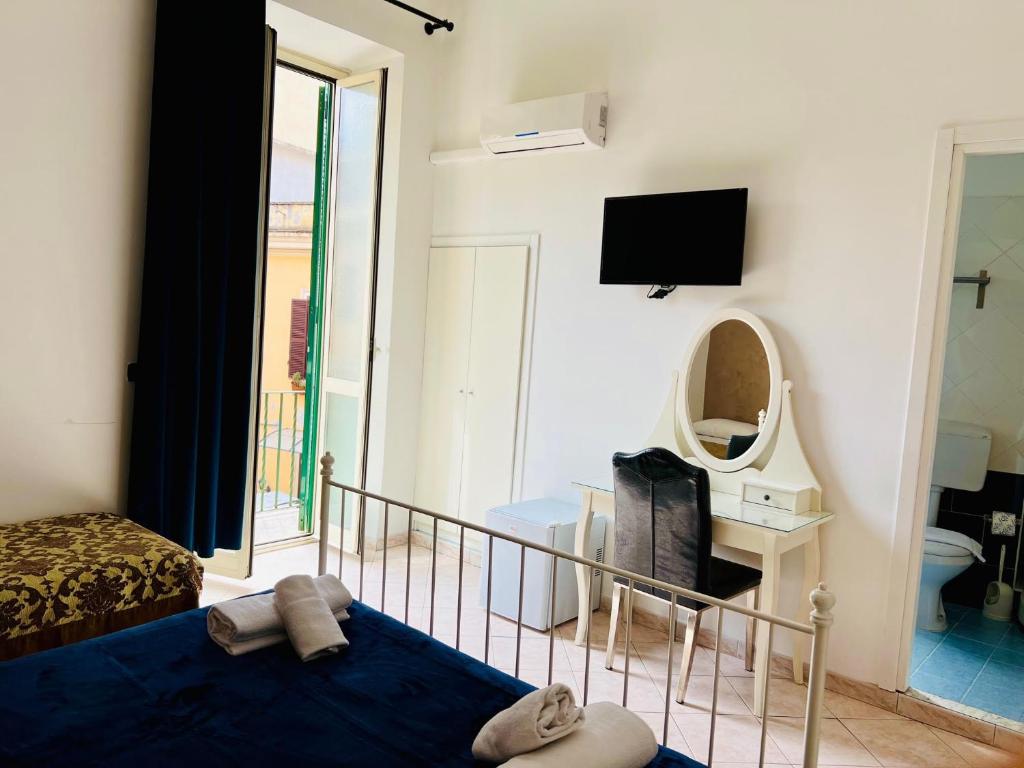 TV a/nebo společenská místnost v ubytování Hotel Pisa
