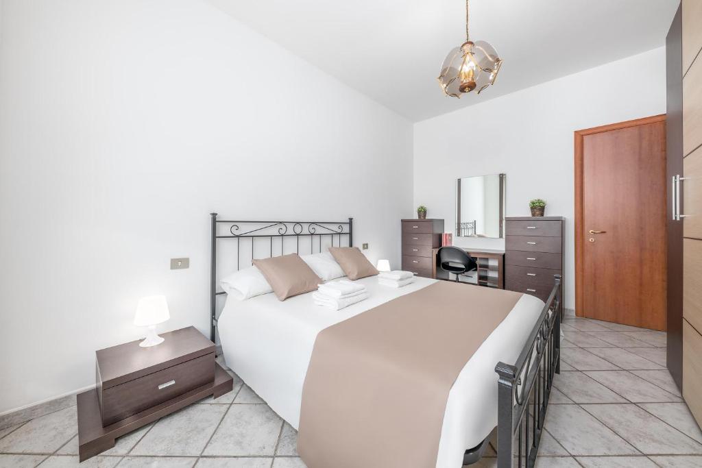 Posteľ alebo postele v izbe v ubytovaní Casa da Suite Evenka
