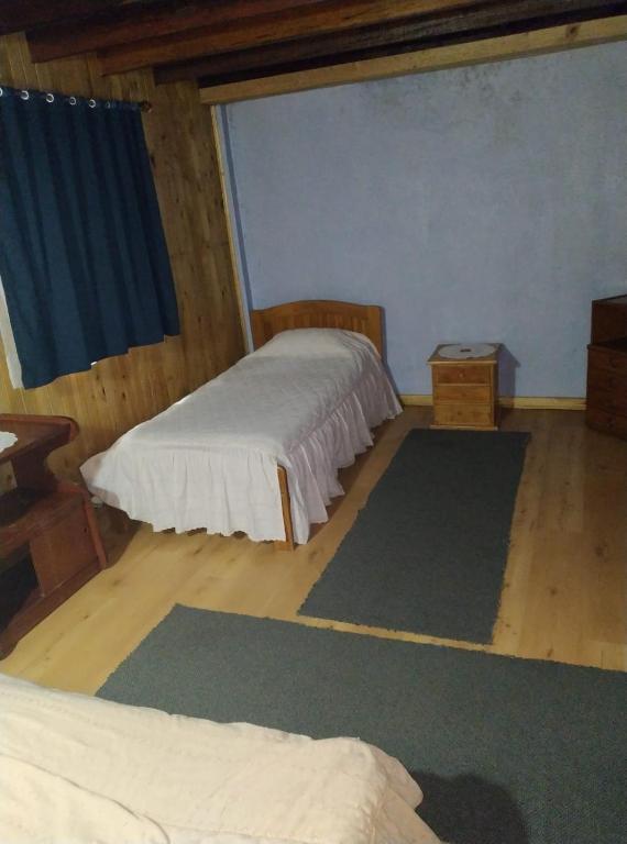 Cama o camas de una habitación en El Peregrino
