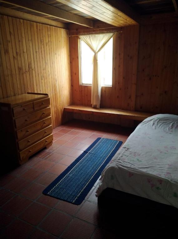 Cama o camas de una habitación en El Peregrino