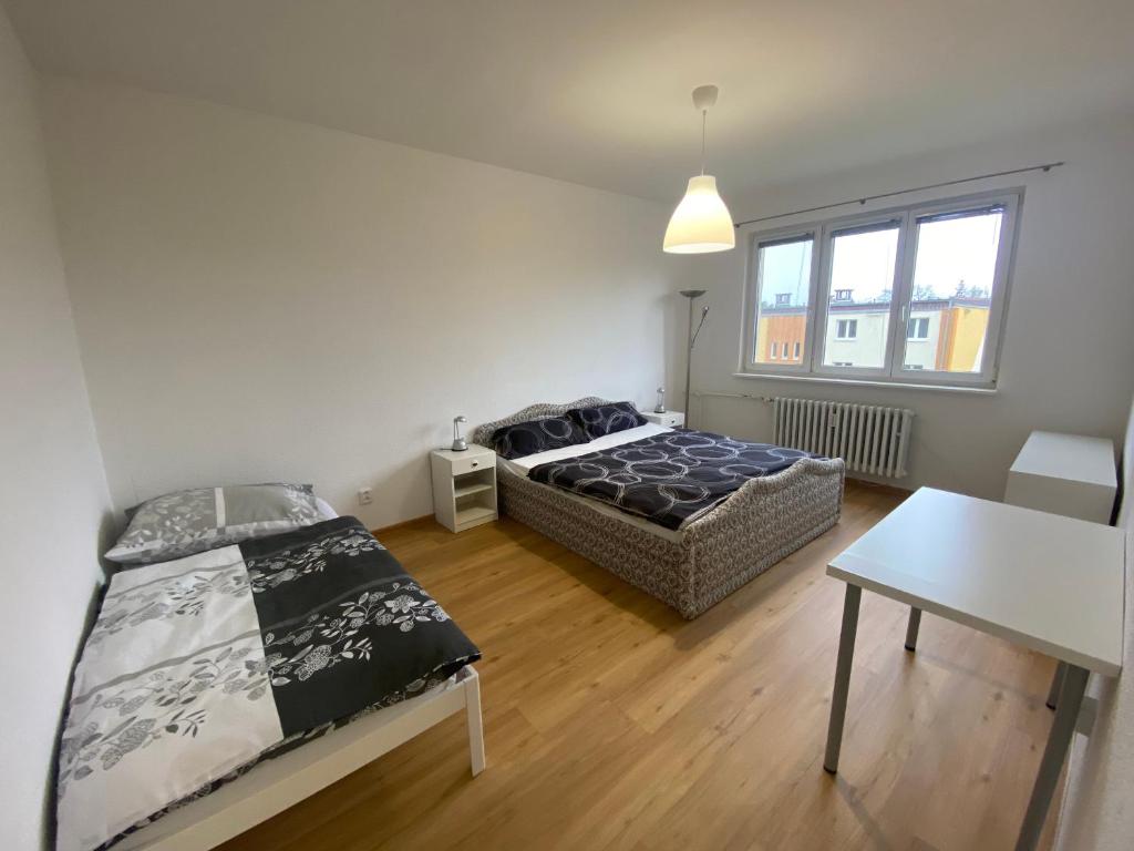 Postel nebo postele na pokoji v ubytování Apartment Šimon II.
