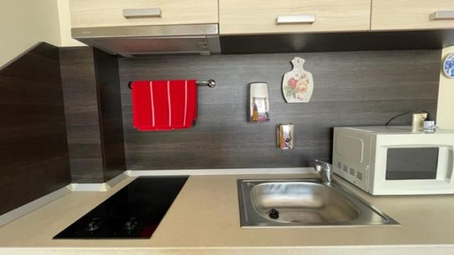 A kitchen or kitchenette at SUMMER BREEZE 406 Studio Sunny Beach