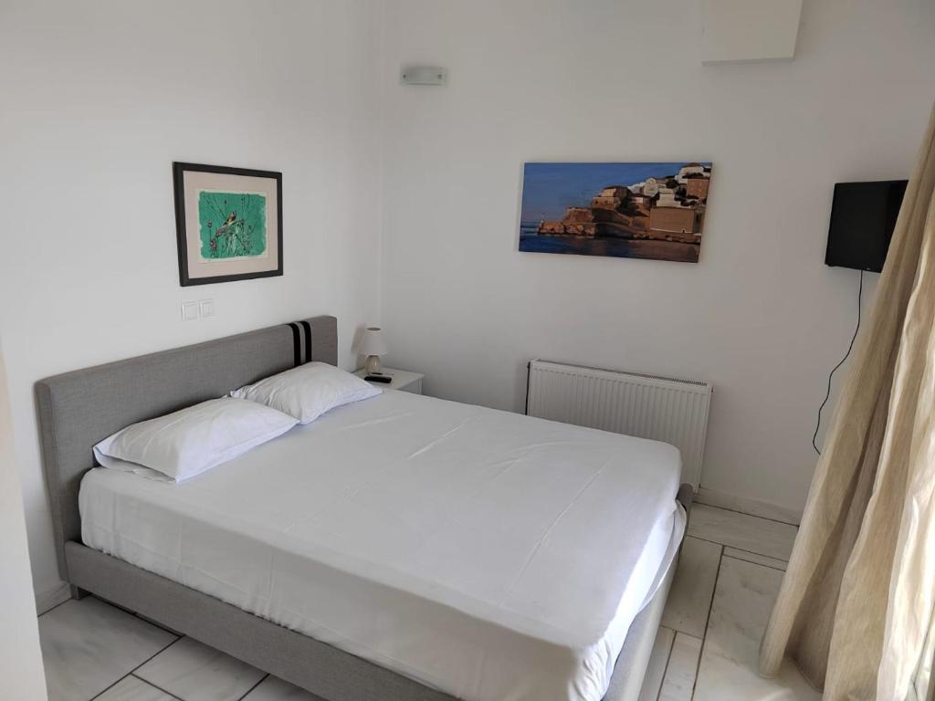 Posteľ alebo postele v izbe v ubytovaní Aegean Panorama in Tinos