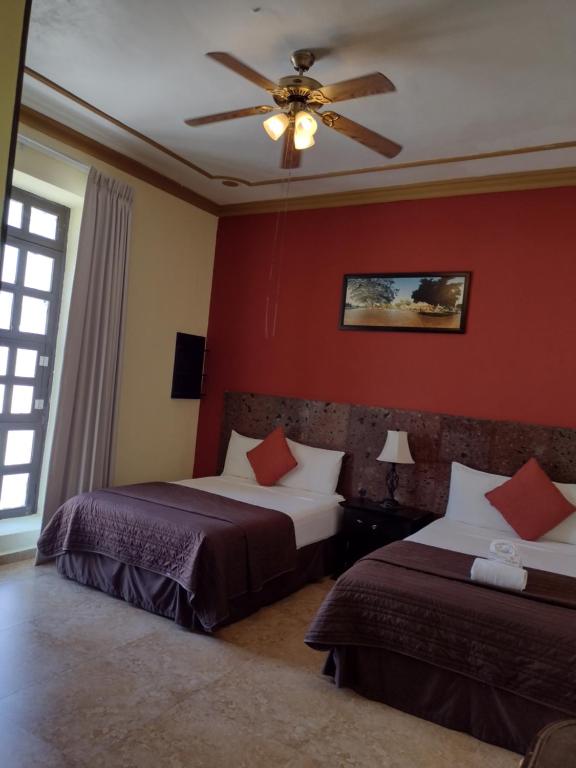 Postel nebo postele na pokoji v ubytování Hotel Rinconada del Convento