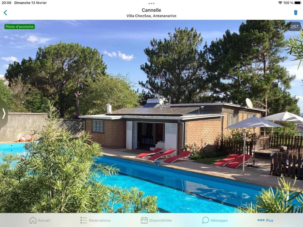 a website of a house with a swimming pool at Villa ChezSoa, Antananarivo in Antananarivo