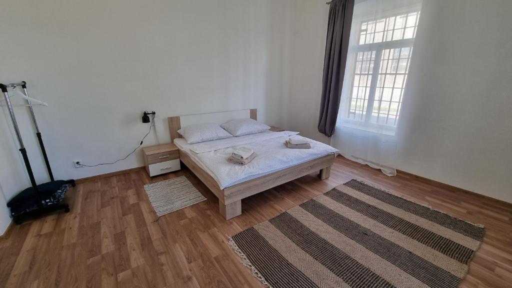 Postel nebo postele na pokoji v ubytování Apartment Porta