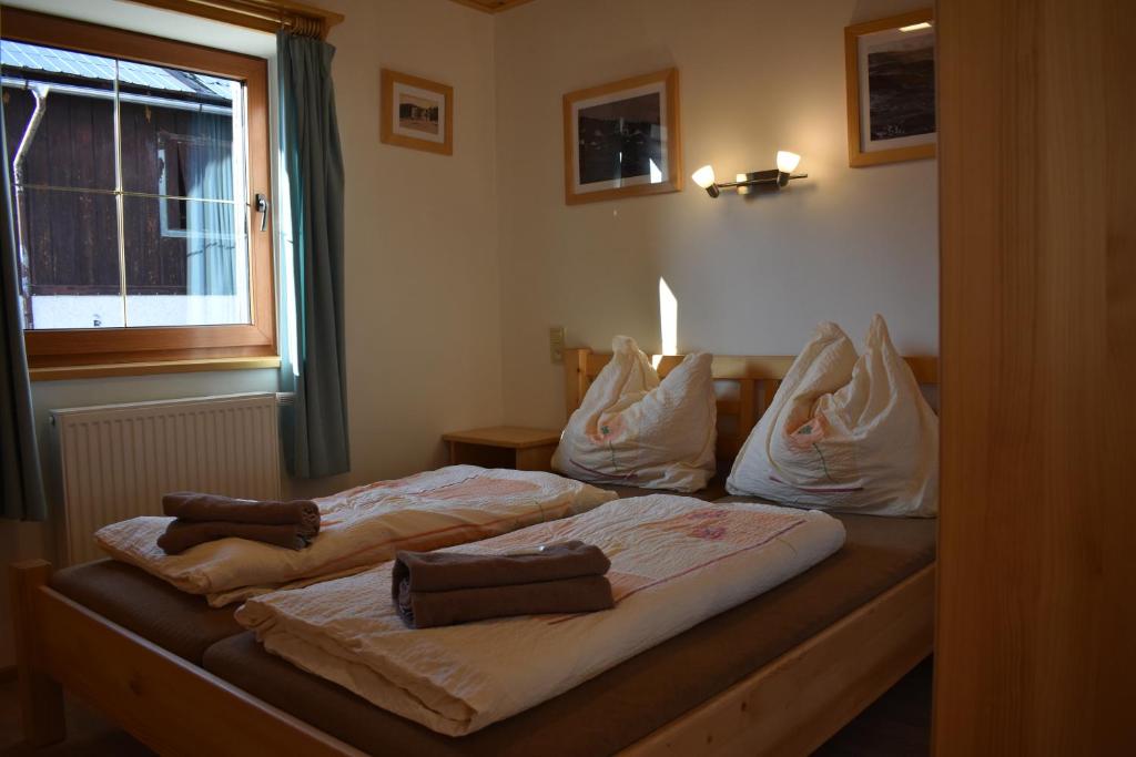 Postel nebo postele na pokoji v ubytování Penzion U Jelena